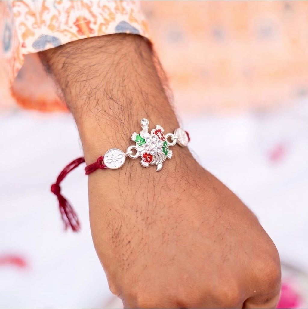 Silver Floral Rakhi – Vibrant Enamel & Soft Thread for Raksha Bandhan