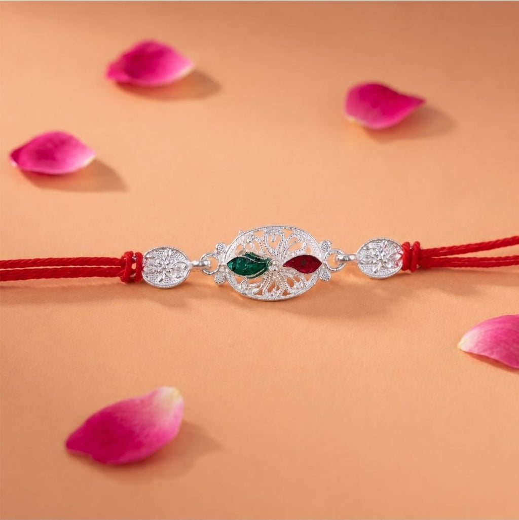 Silver Oval Rakhi-Elegant Design with Red Thread