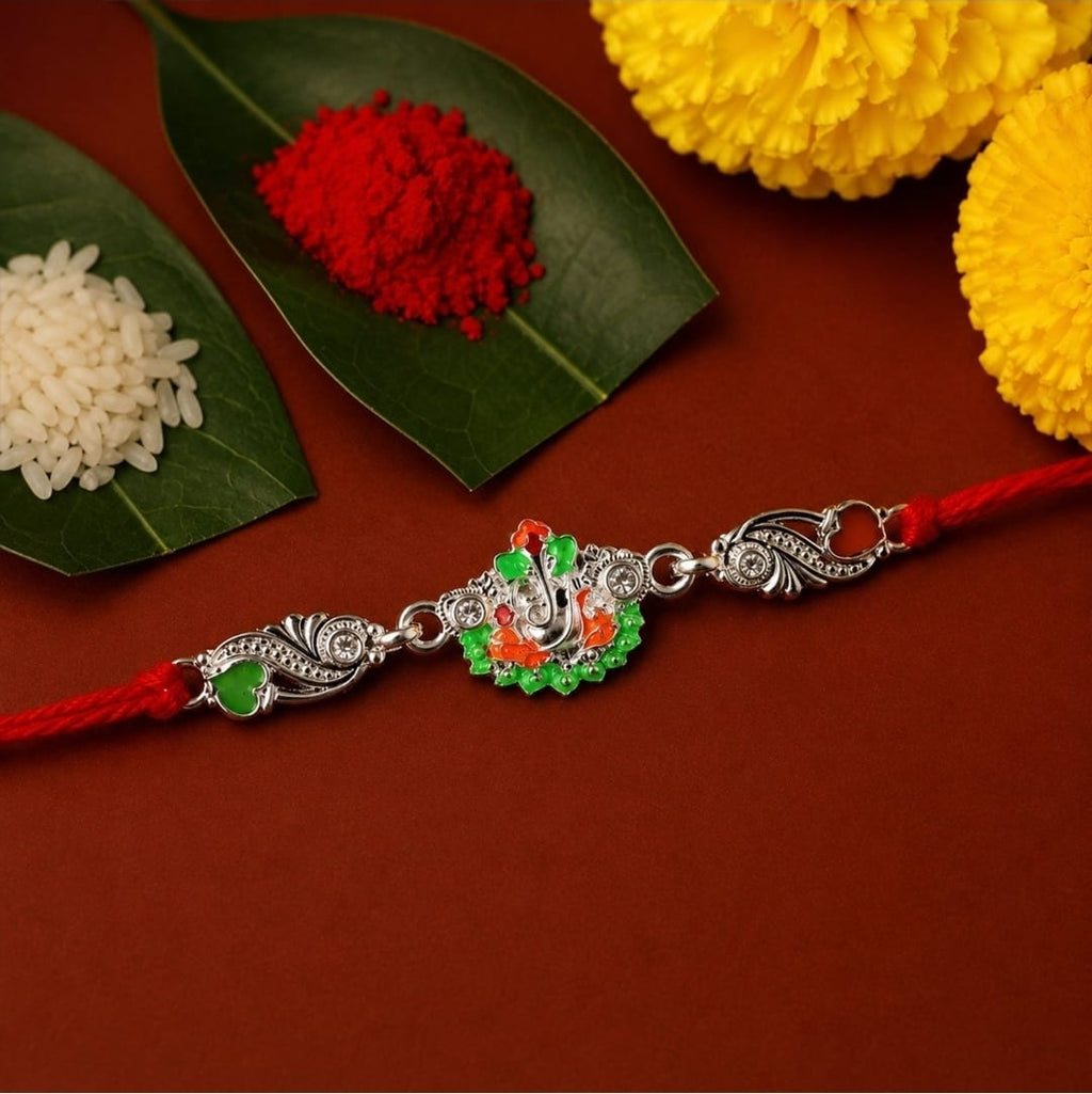 Silver Ganesh Charm with Red Dori for Brother