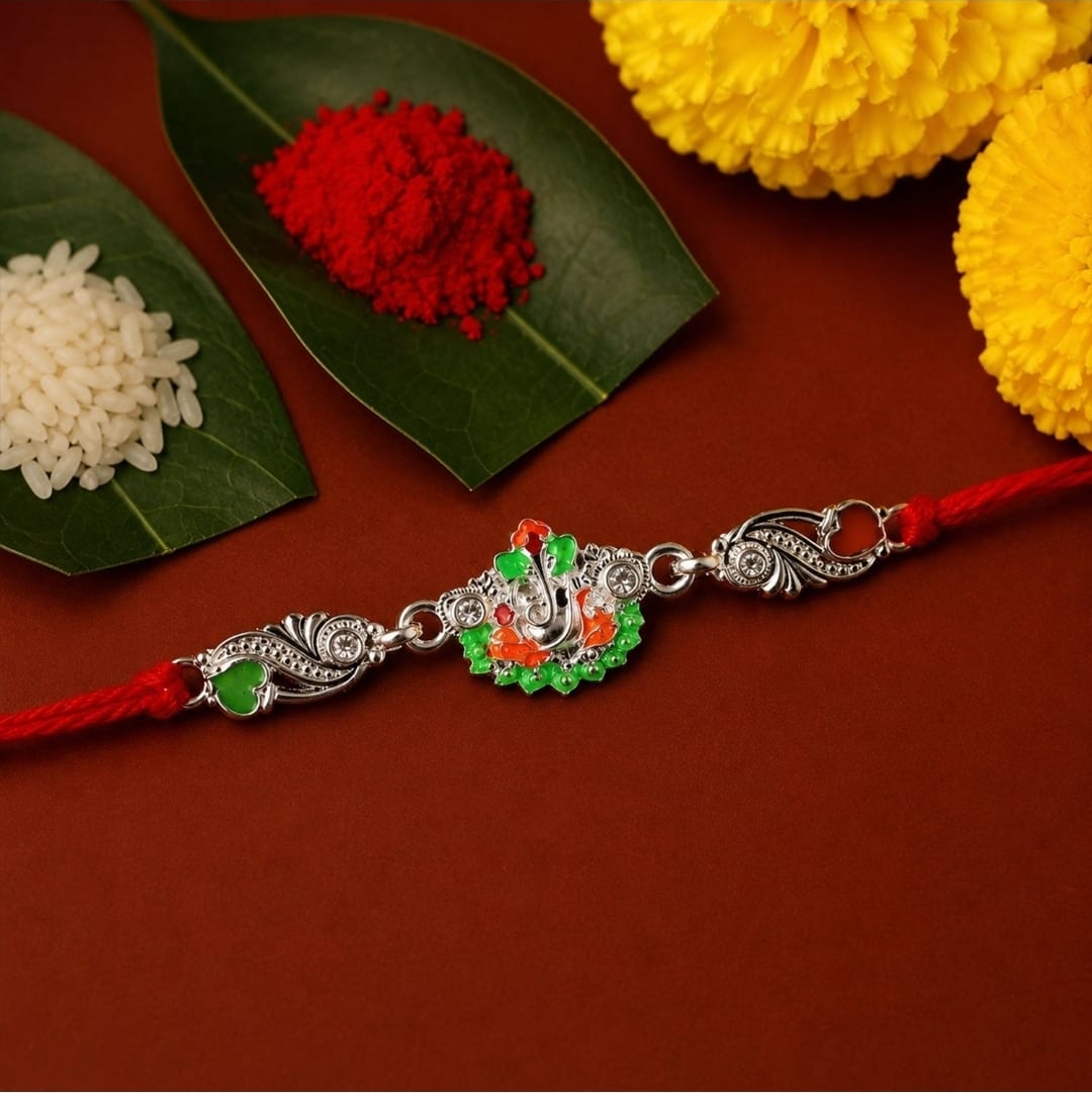 Silver Ganesh Charm with Red Dori for Brother