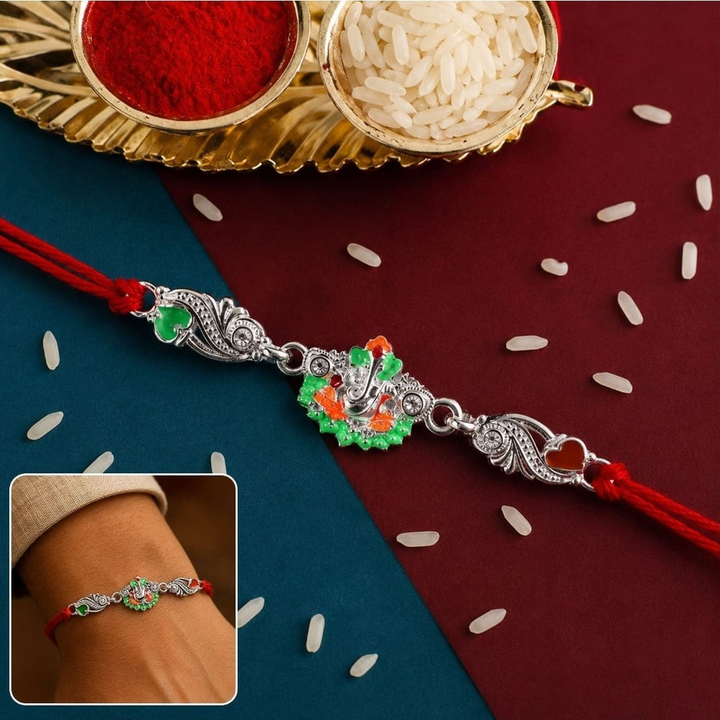 Silver Ganesh Charm with Red Dori for Brother